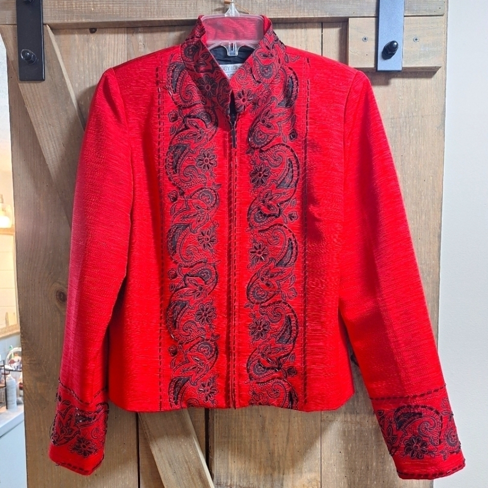A Vintage Maggy London embellished 100% silk blazer in a size 4. Pre-loved